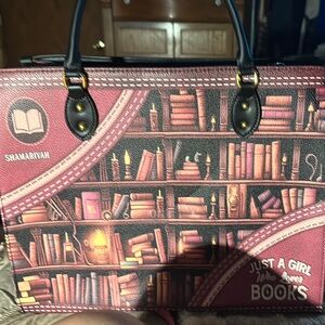 Red and Black Satchel Bag with Elegant Design